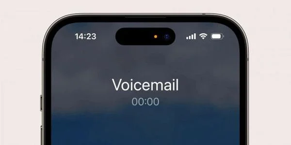 Vad är den orange pricken och den gröna pricken i hörnet av iPhone-skärmen?